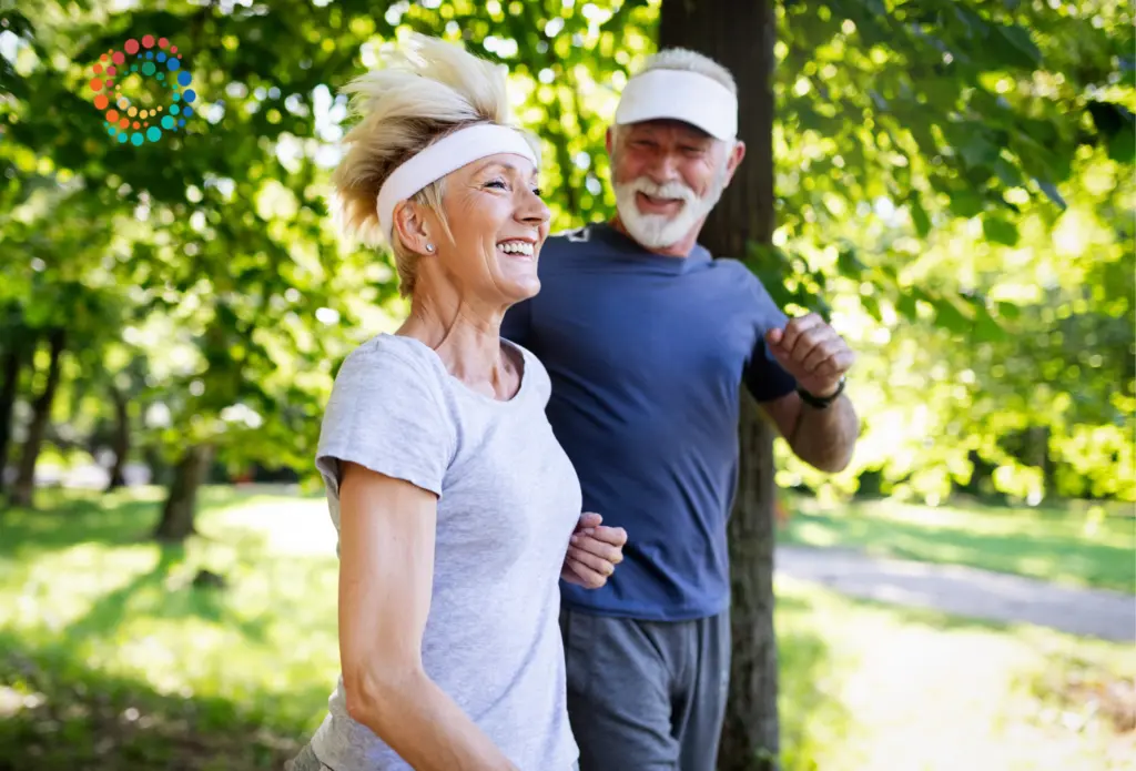 Older man and woman getting exercise outside